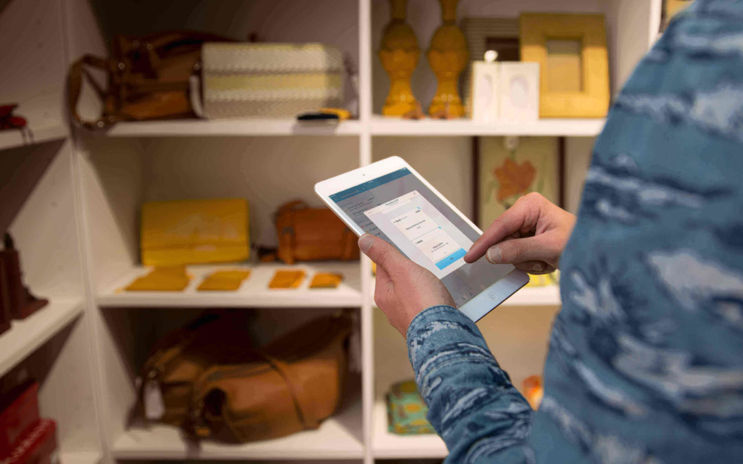 man on his tablet looking at his accounting software xero