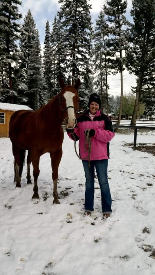 Lawhorn CPA Group HR director Debbie with a horse during a trip to Montana in 2019